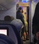 Man Attempts to Force Himself Off Plane