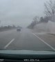 Red Pickup Hydroplanes Into Ditch