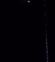 Bright Object Crosses Satellite Path In Night Sky