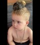Little Boy With a Chicken on His Head