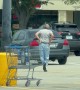 Man Chases After Dropped Money in the Wind