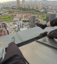 Guy Saves Friend From Slipping Off Roof