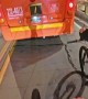 Bikers Follow Behind Bus With Tied Ropes