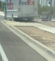 Mail Driver Drives On Sidewalk Dirt