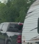Camping Woman Rides Comfortably In Truck Bed