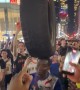 NYC Icon Leh-Boy Celebrates Knicks Win With Tire Balanced On Head