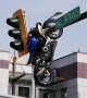 Motorcycle Hanging From Traffic Light After Collision