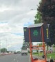 Improperly Secured Construction Sign Rolls Into Traffic