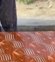 Man Designs Swirled Table Top