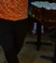 Dutch Fan Carries Arm-Load of Beer to Table