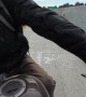 Biker Saves Kitten on Highway
